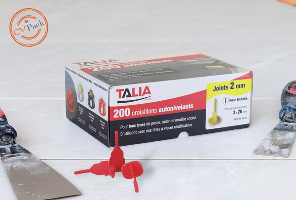 une boite de croisillons autovolants pour l'industrie